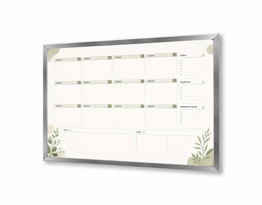 Metalen Magneetbord met overzichtelijke strakke planner omlijst door elegante groene botanische randen