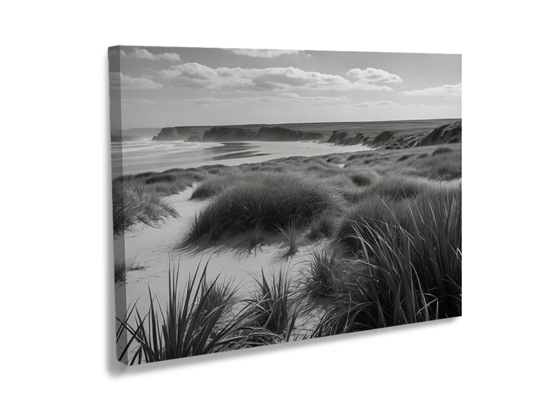 Metalen bord met zwart-wit afbeelding van een strandlandschap