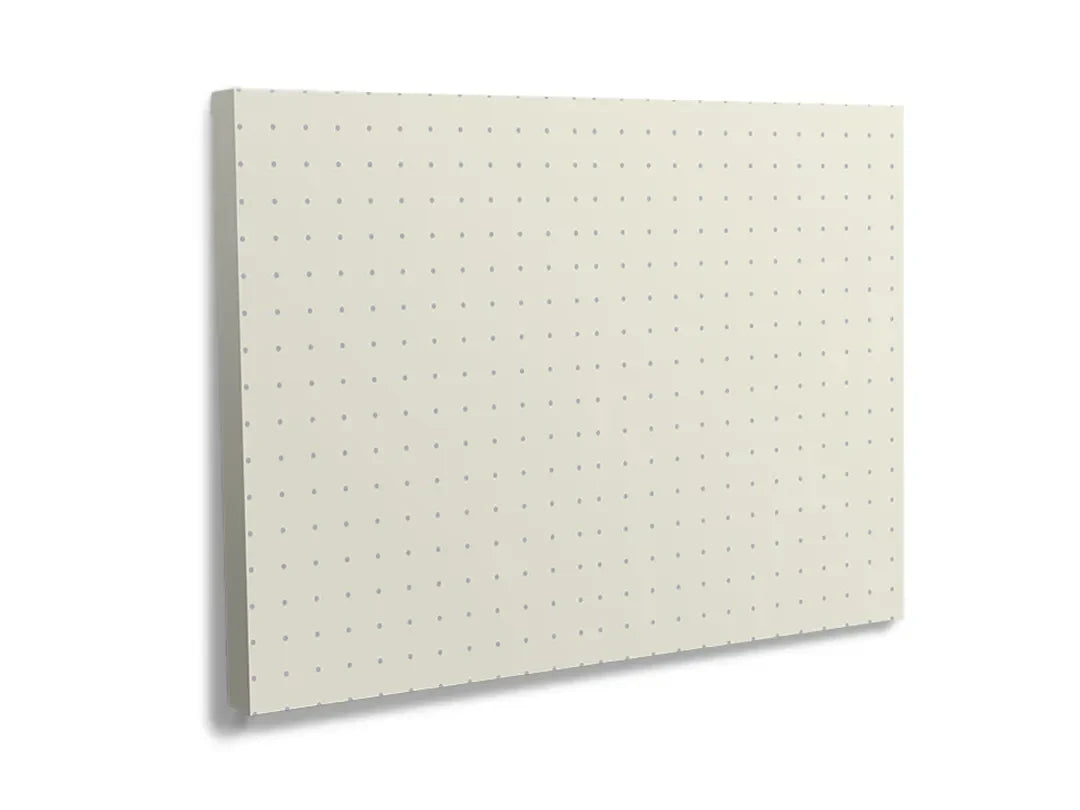 Metalen magneetbord met een stijlvol stippenpatroon, ideaal als decoratie of memobord.