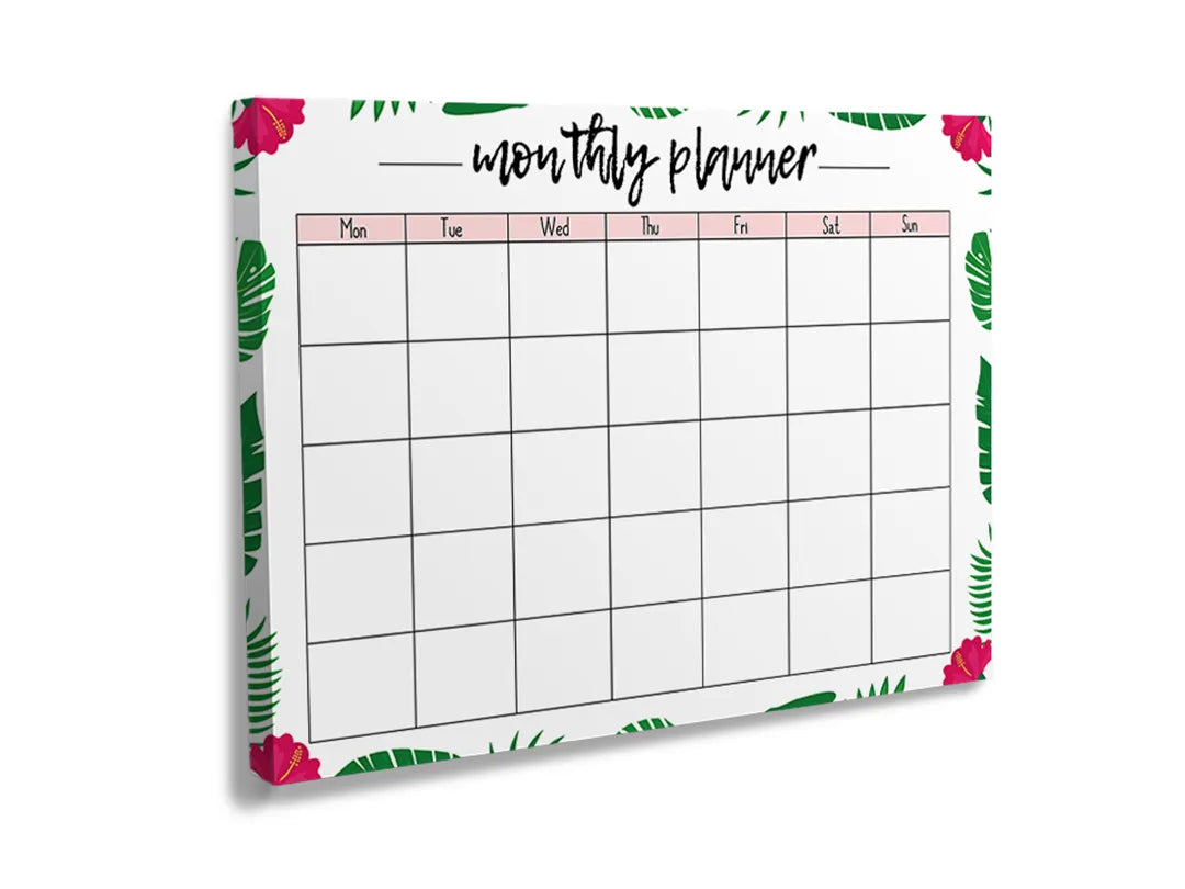 Metalen magneetbord met tropische bladeren voor als planner en memobord.