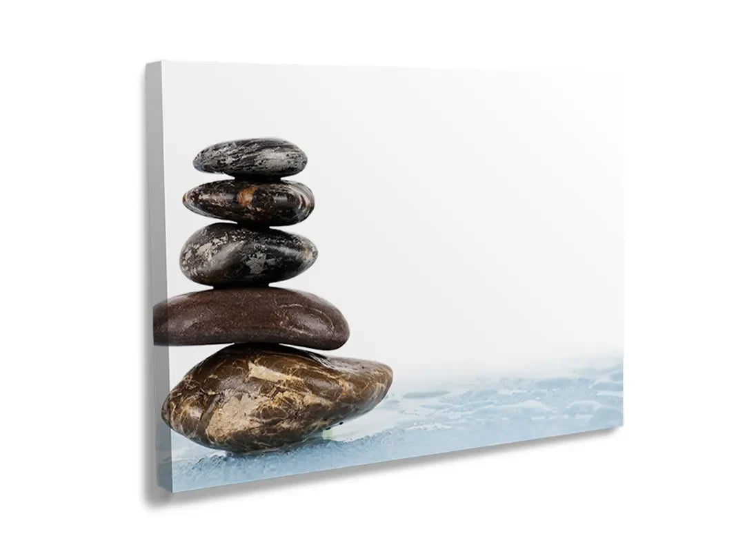 Metalen magneetbord met een afbeelding van een stapel stenen.
