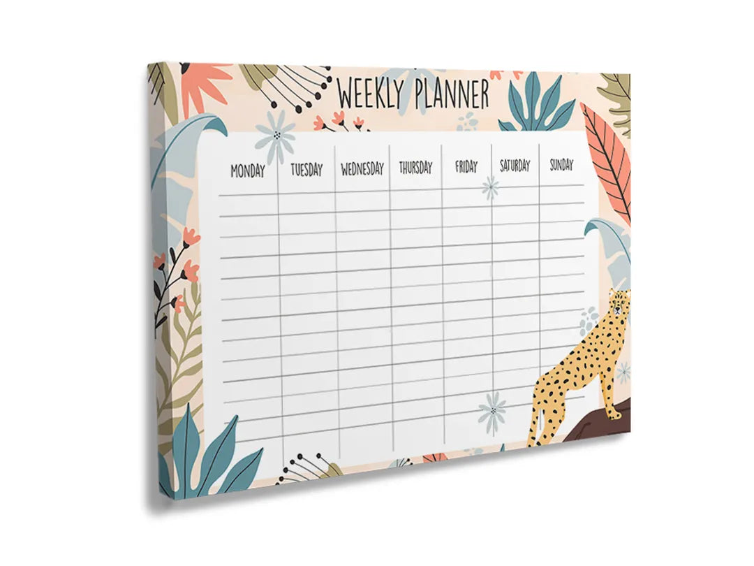 Metalen magneetbord met wekelijkse planner en kleurrijke bloemen en bladeren.