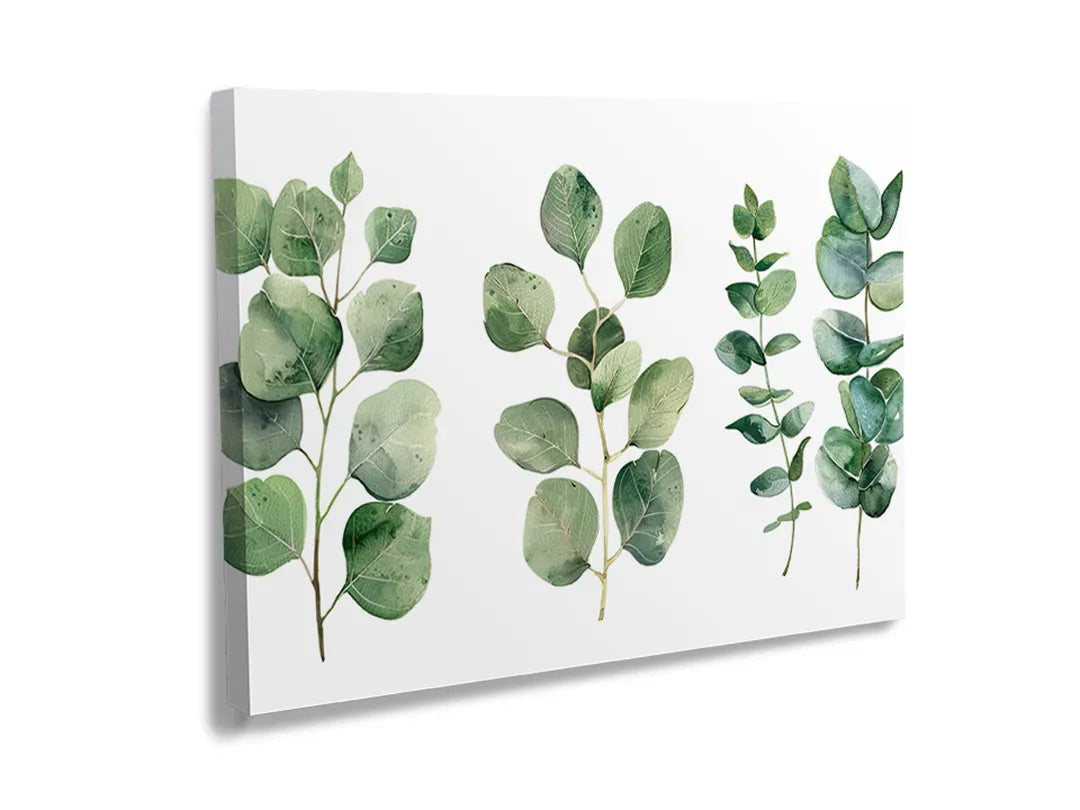 Metalen magneetbord met groene bladeren als decoratie.