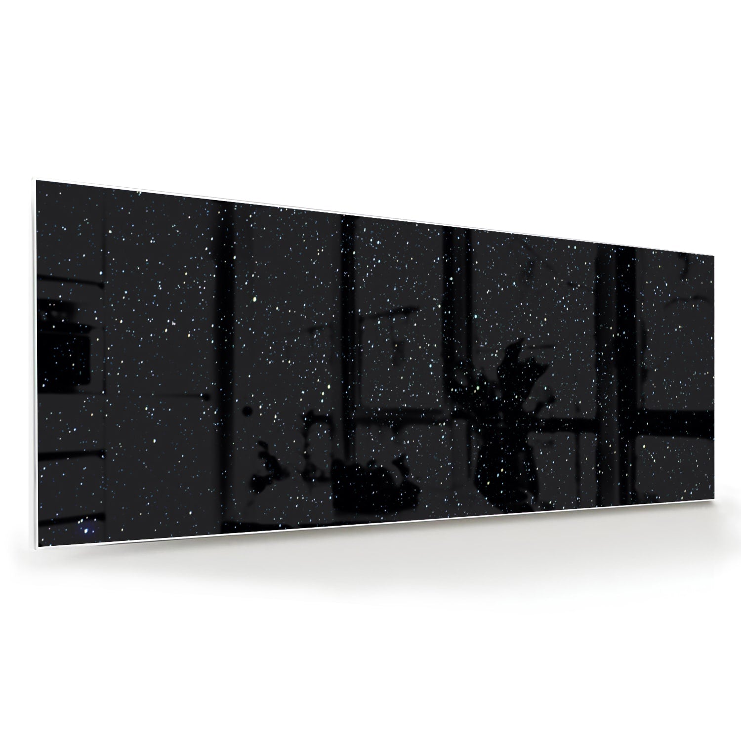 Glas schilderij met sterren op een zwarte achtergrond aan de muur