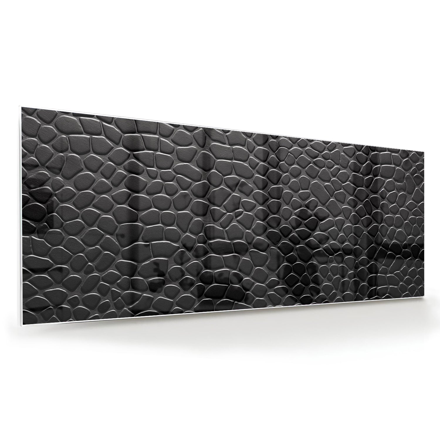 Zwart glazen schilderij met textuur in een moderne woonkamer.