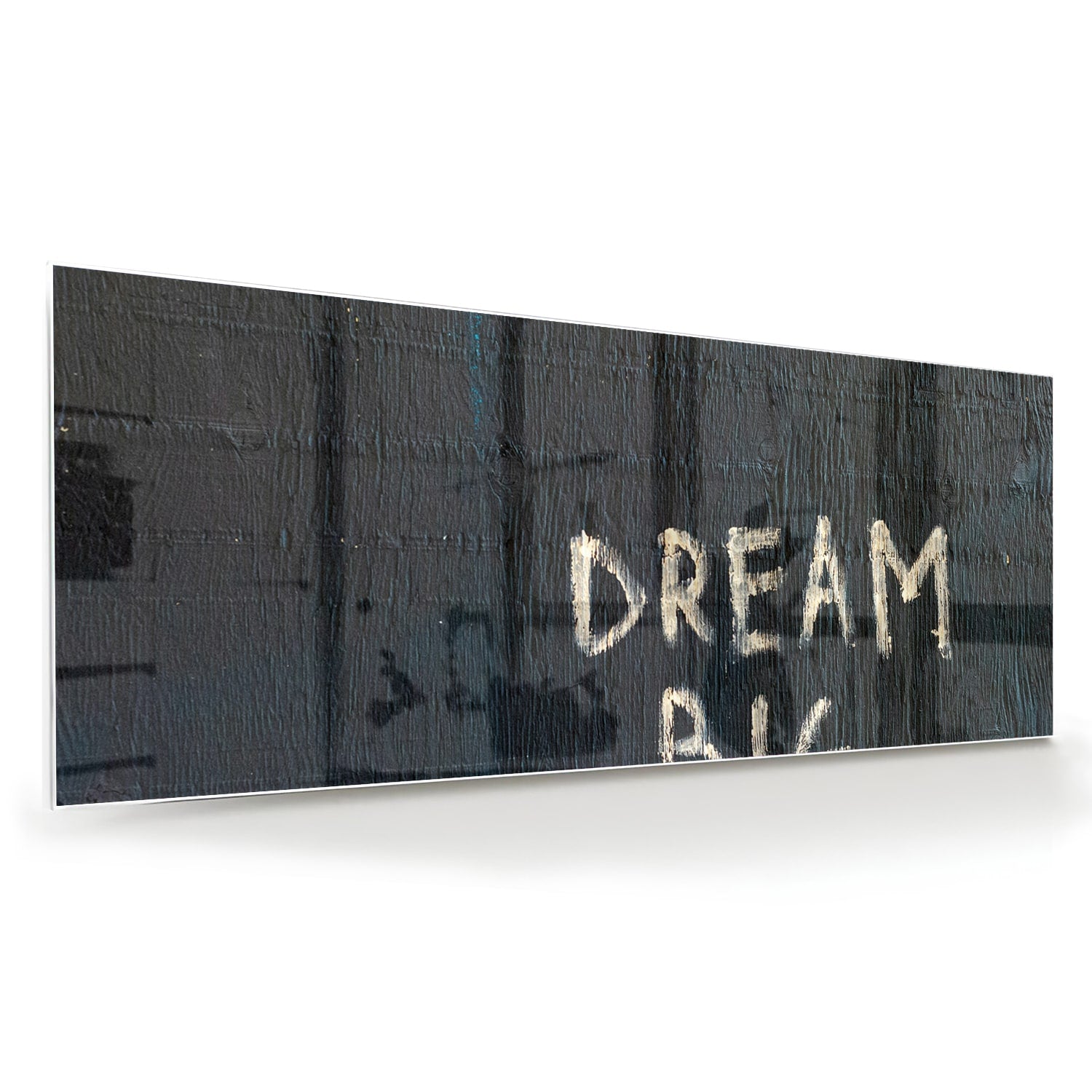 Glas schilderij met tekst 'DREAM BIG' in modern interieur