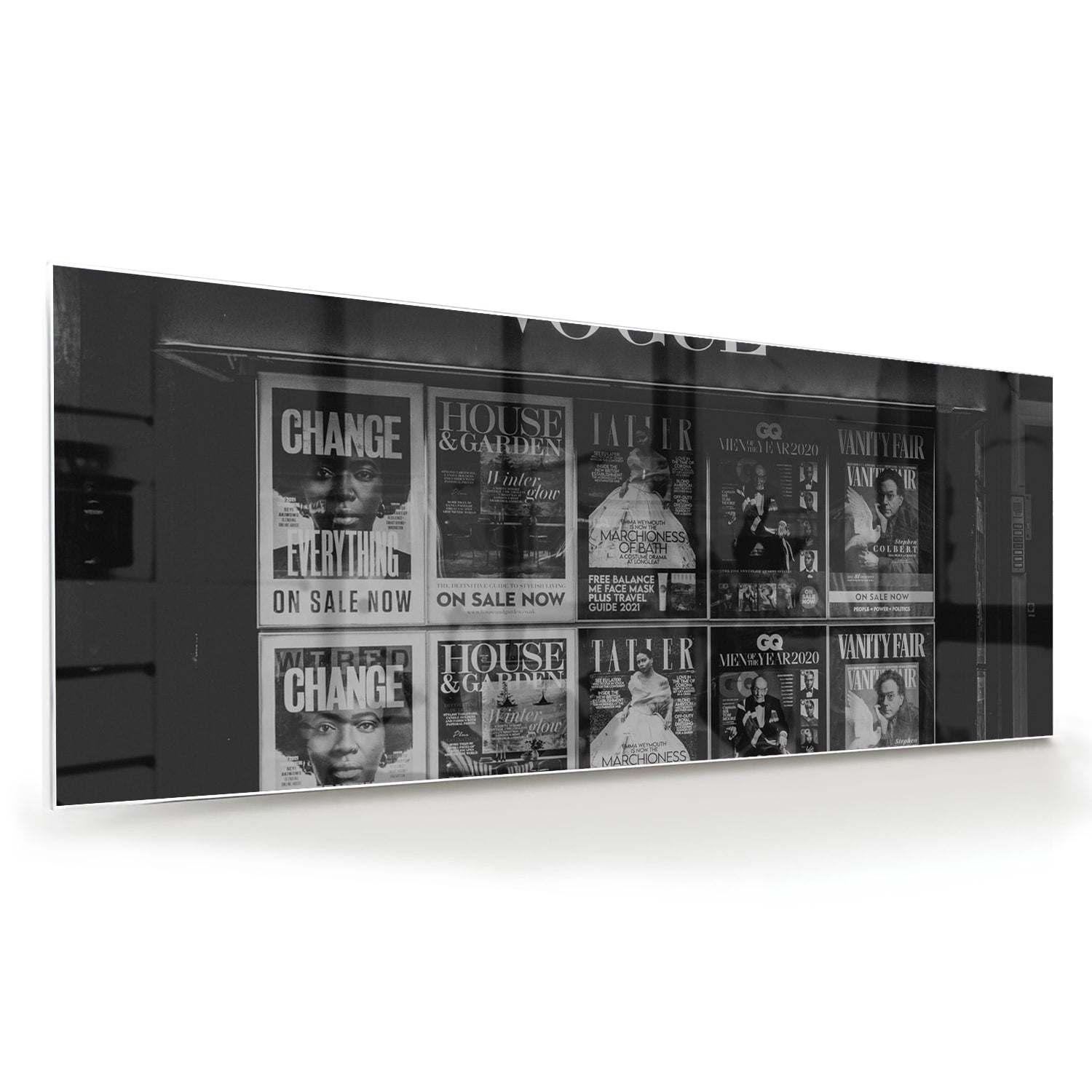 Glazen schilderij van Vogue met modecovers in modern interieur
