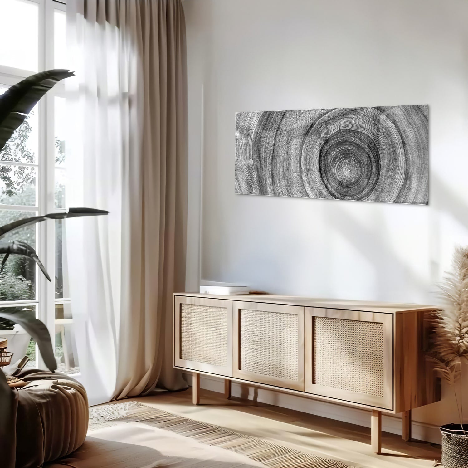 Abstract glazen schilderij in grijstinten met cirkels aan de muur