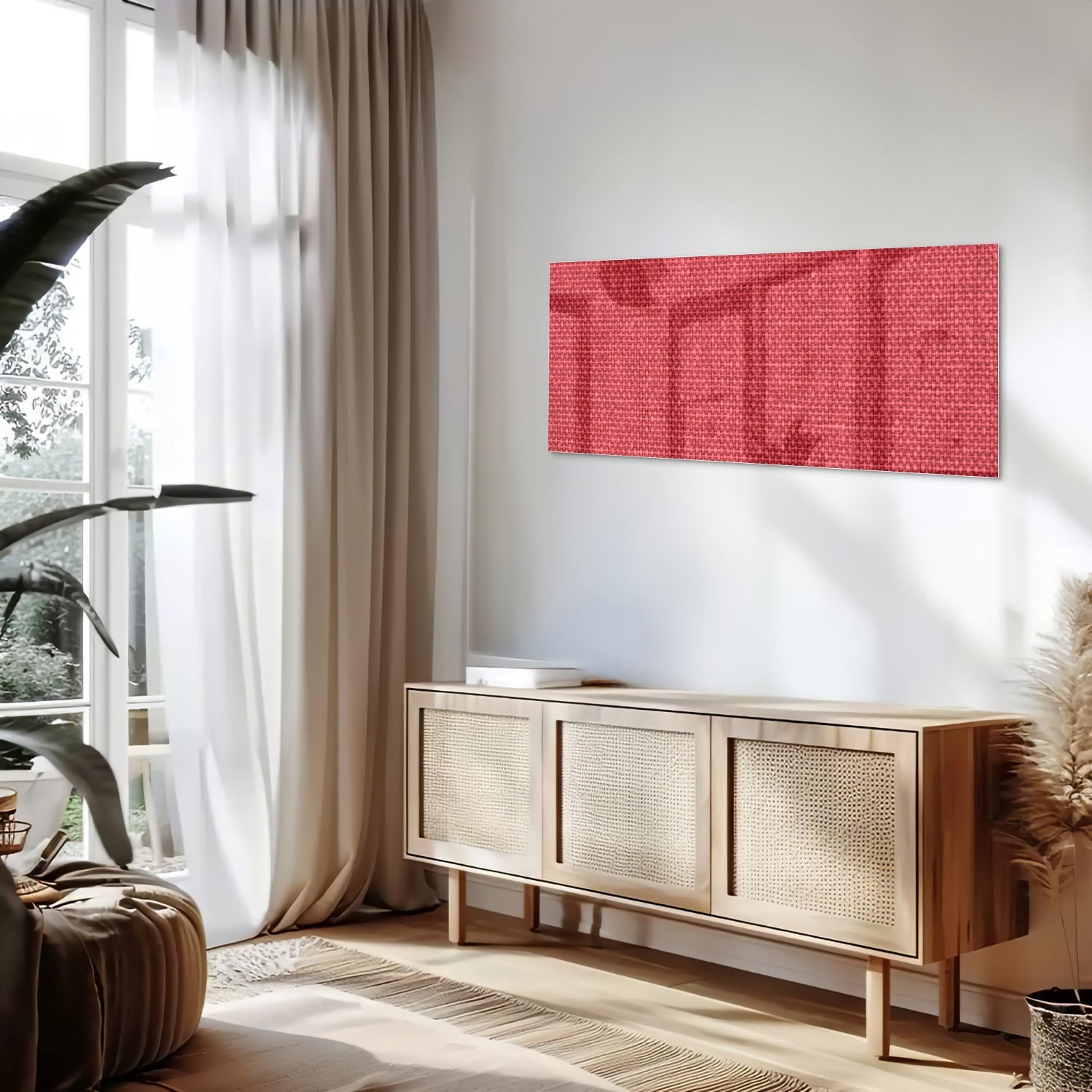 Modern glazen schilderij in helder rood aan de muur boven een licht houten kast.