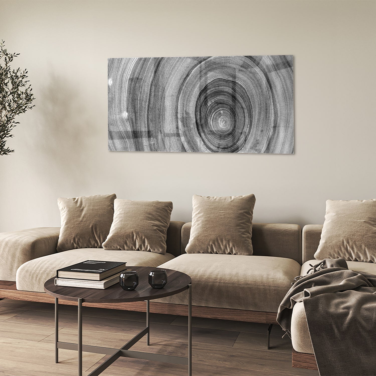 Abstract glazen schilderij in grijstinten met cirkels aan de muur