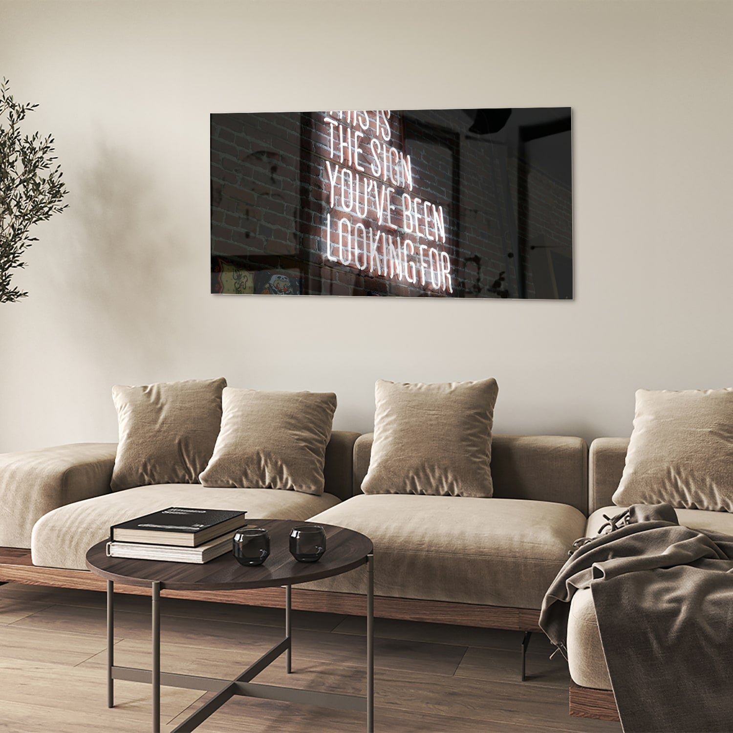 Glazen schilderij met inspirerende tekst in een modern interieur.