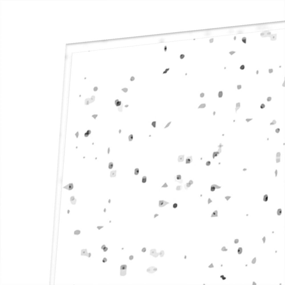 Modern glazen schilderij met speckles aan de muur in een lichte woonkamer