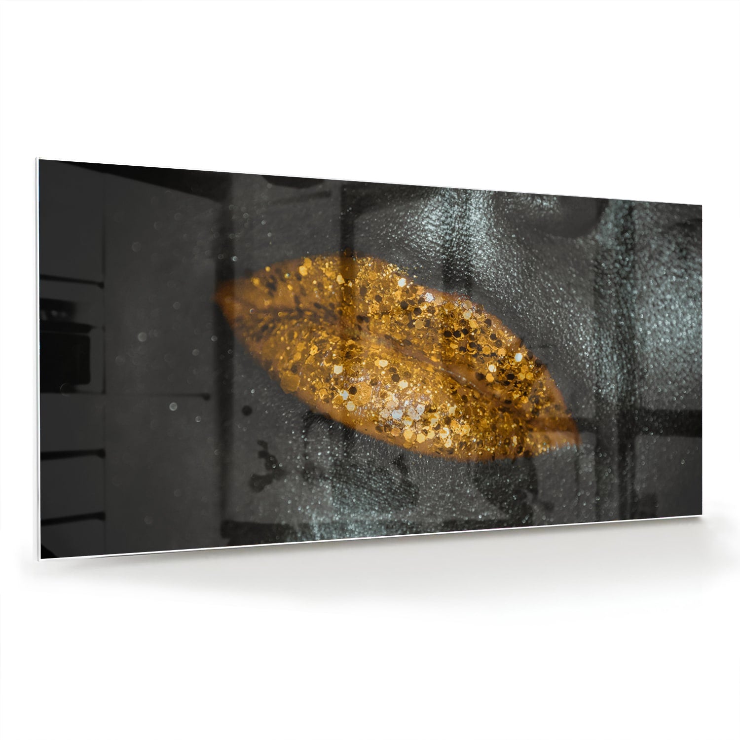 Glazen schilderij met een gouden blad op een zwarte achtergrond, perfect voor moderne interieurs.