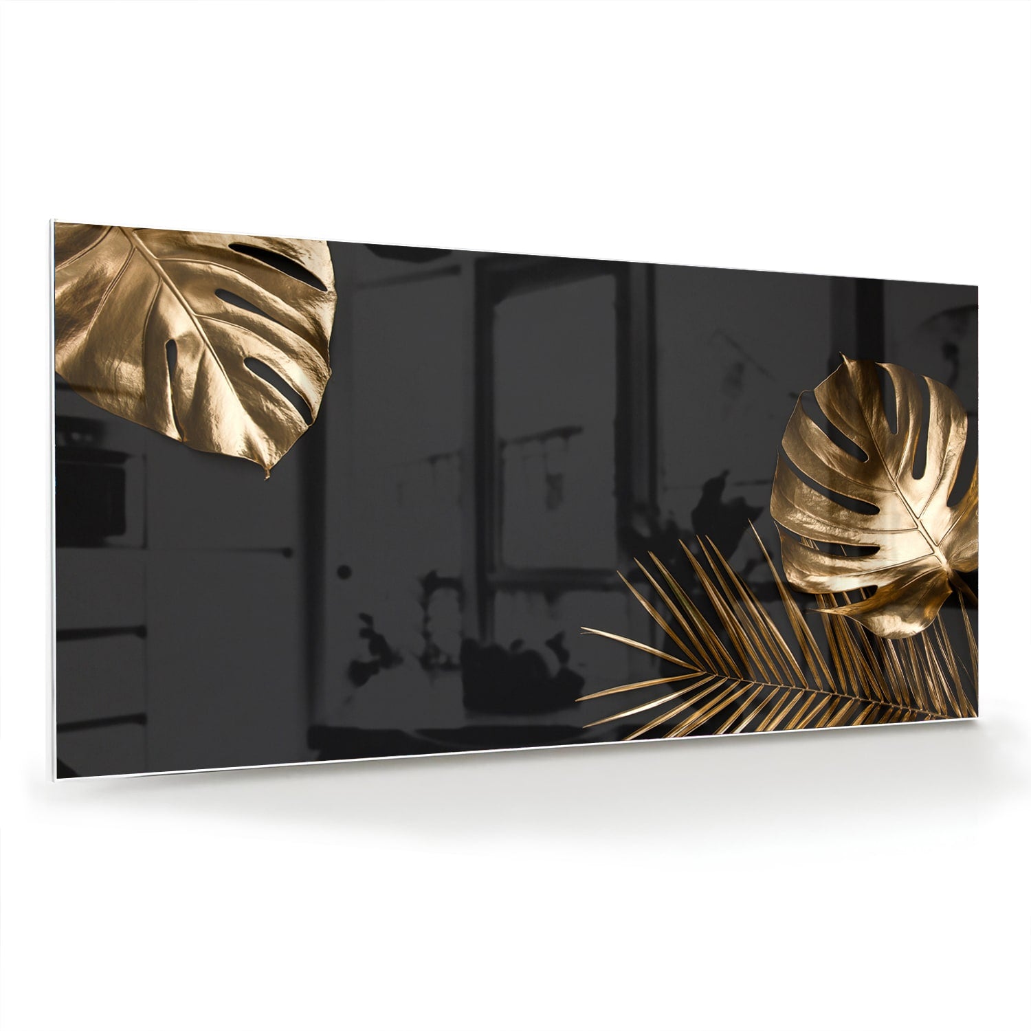 Glazen schilderij met gouden bladeren op een zwarte achtergrond in een woonkamer