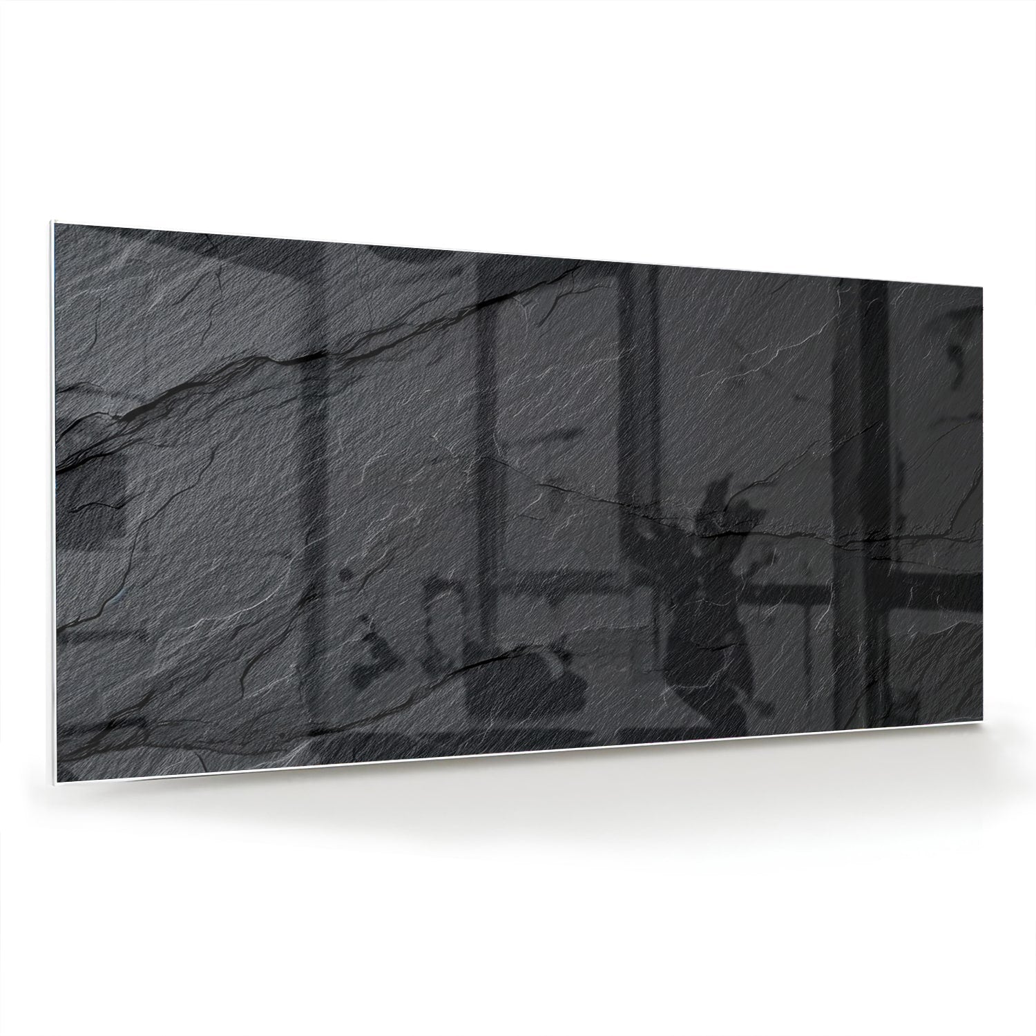 Modern glazen schilderij met abstracte zwart-witte patronen aan de muur