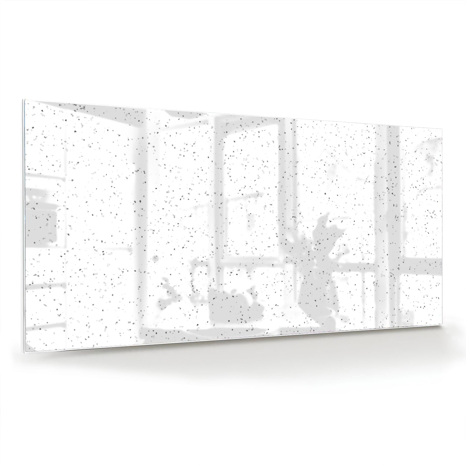 Modern glazen schilderij met speckles aan de muur in een lichte woonkamer