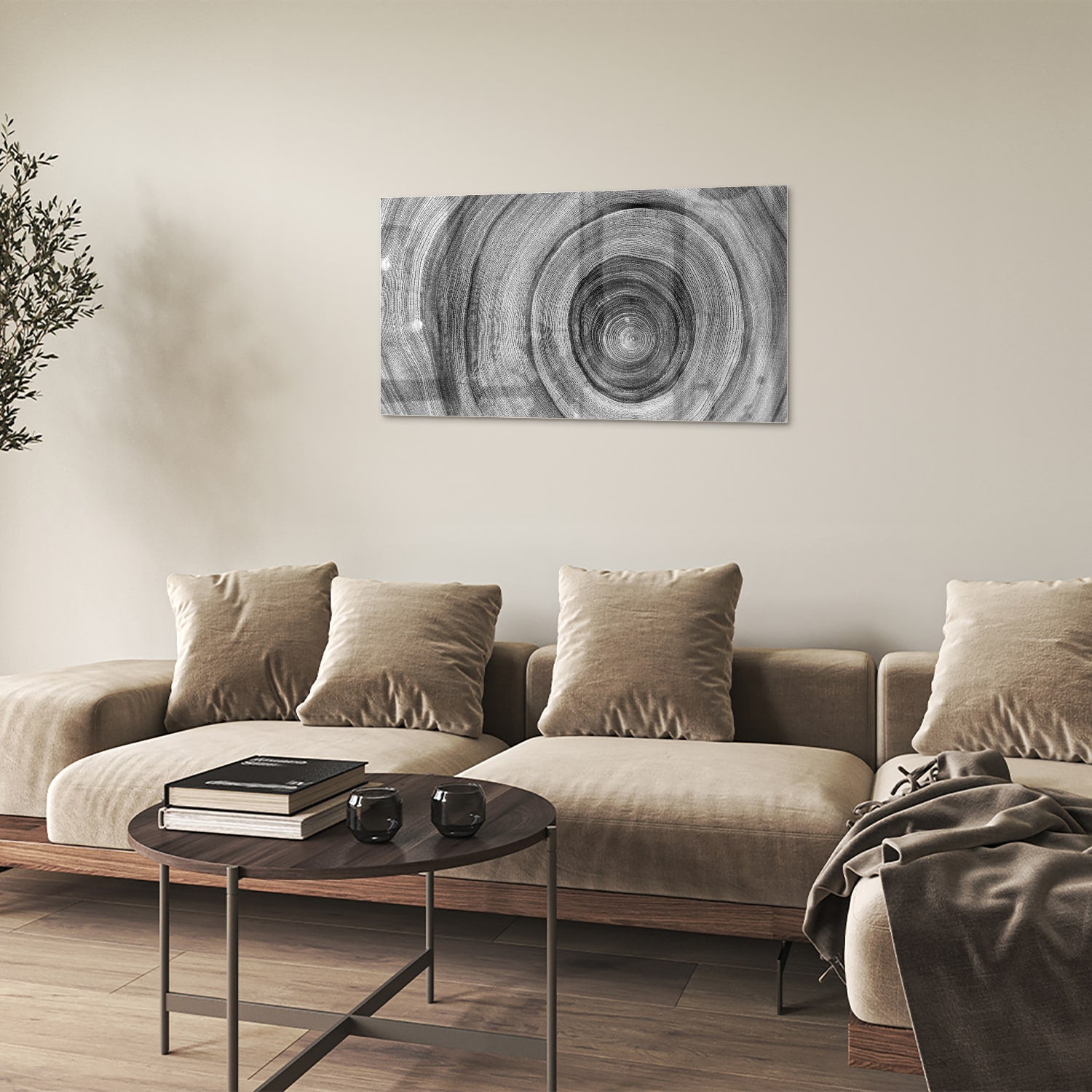 Abstract glazen schilderij in grijstinten met cirkels aan de muur