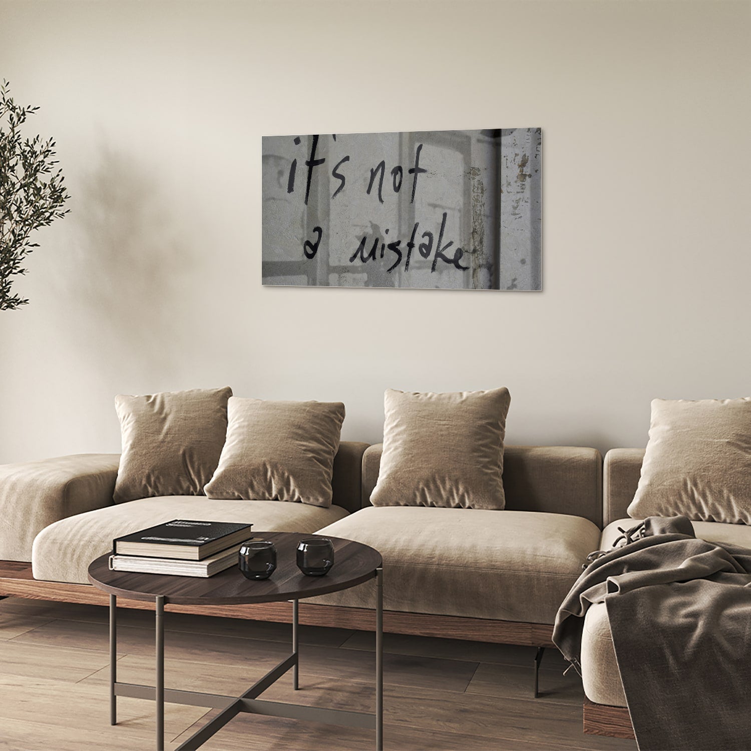 Glazen schilderij met de tekst 'it's not a mistake' aan de muur