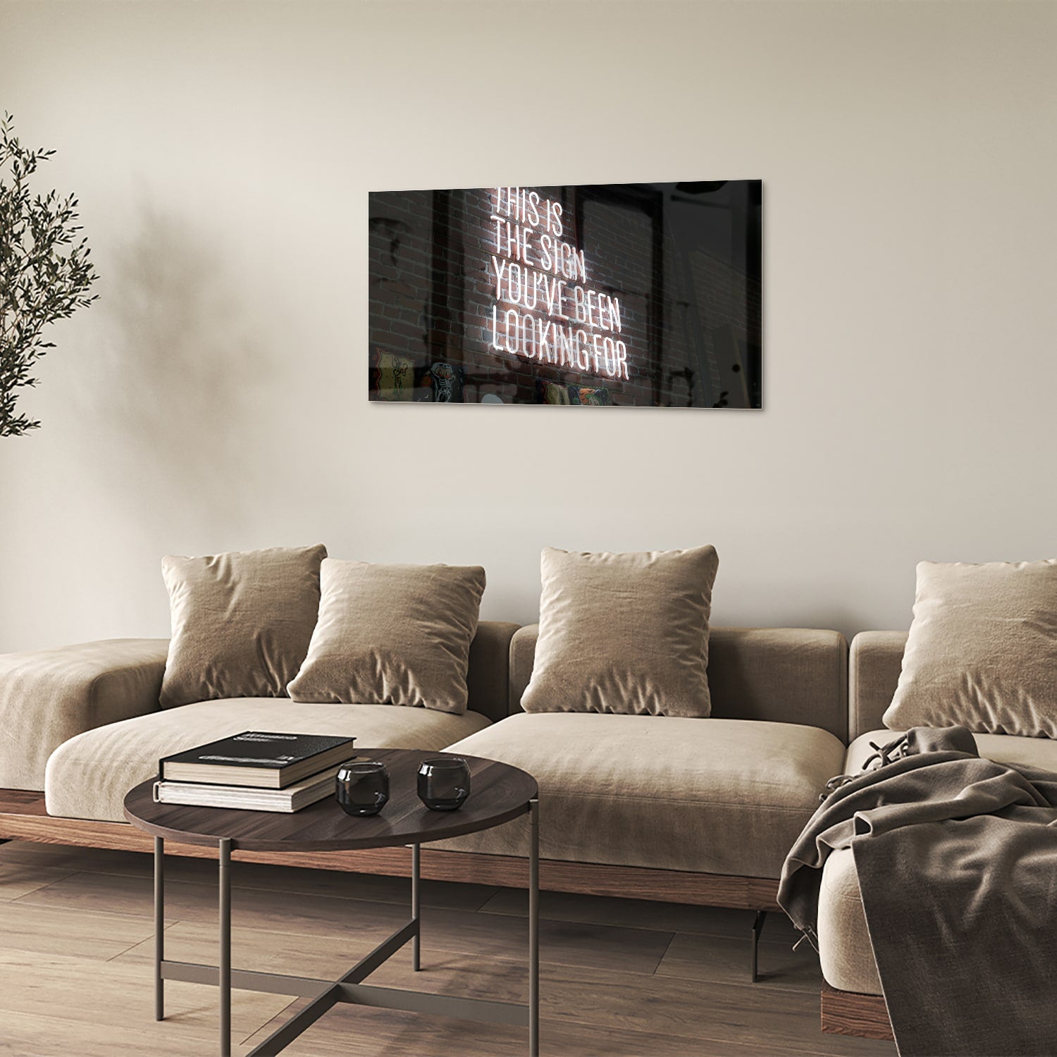 Glazen schilderij met inspirerende tekst in een modern interieur.