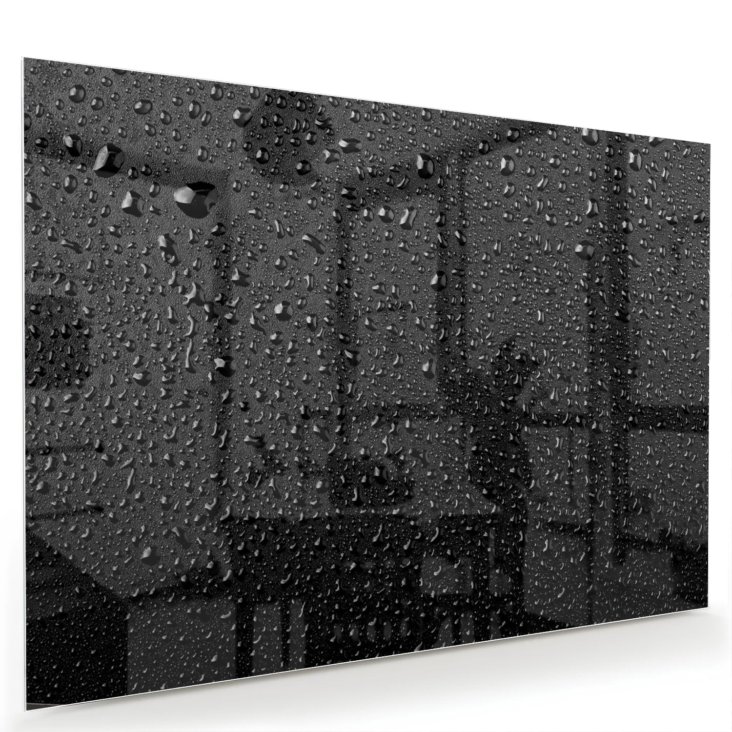 Glas schilderij met druppels op een zwart oppervlak, ideaal voor moderne interieurs.