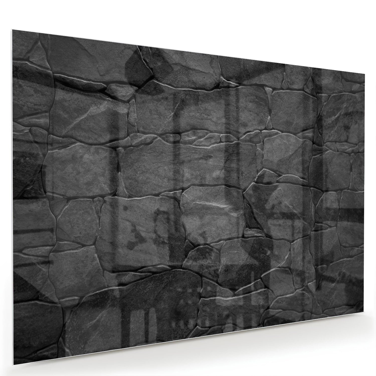 Moderne glazen schilderij in zwart en grijs hangt aan de muur.