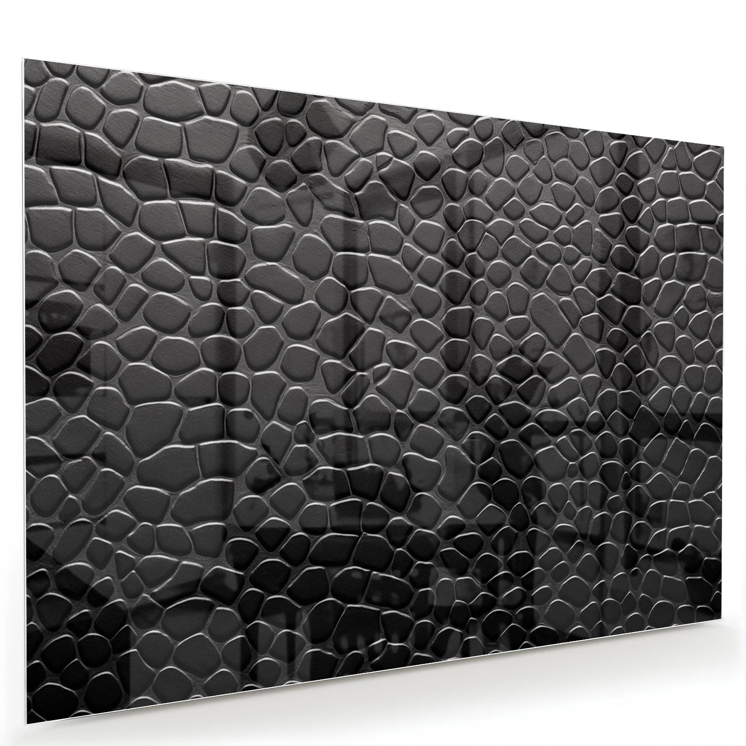 Zwart glazen schilderij met textuur in een moderne woonkamer.