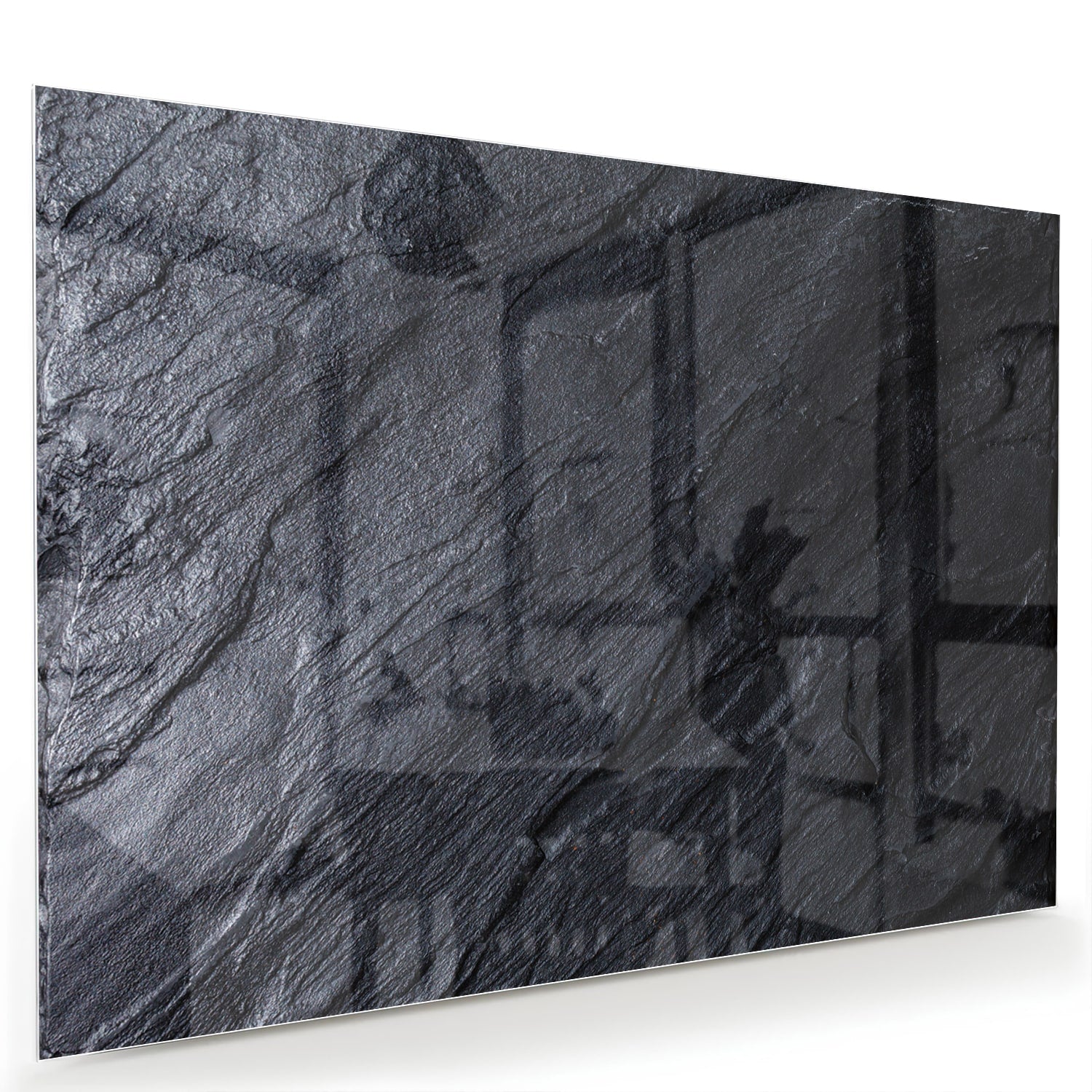 Modern glazen schilderij met abstracte zwart-witte textuur aan de muur.