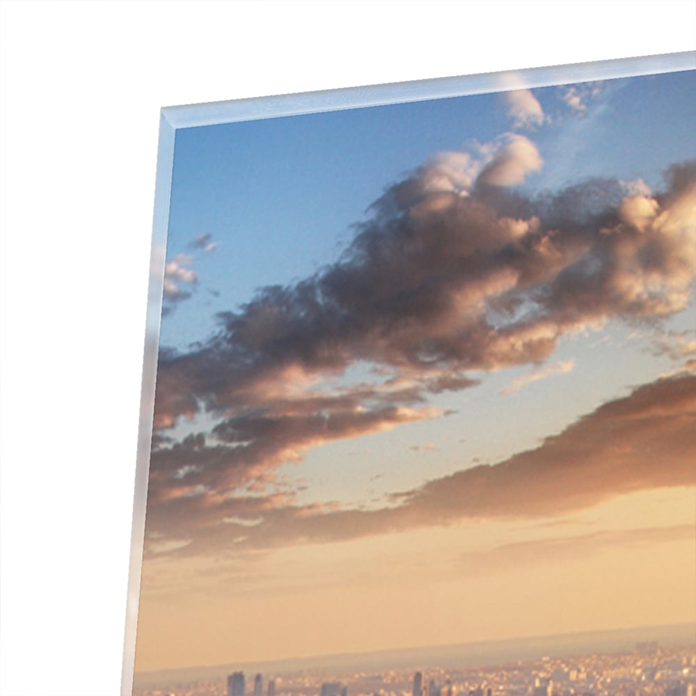 Glazen schilderij van de skyline van New York bij zonsondergang.