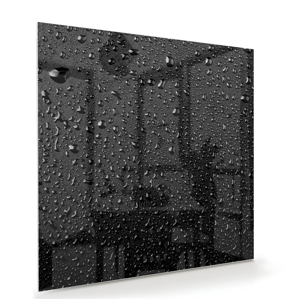 Glas schilderij met druppels op een zwart oppervlak, ideaal voor moderne interieurs.