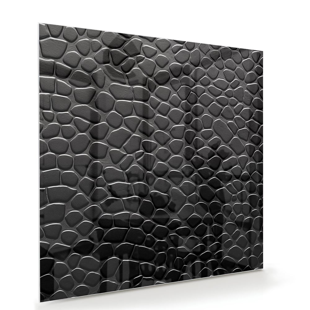 Zwart glazen schilderij met textuur in een moderne woonkamer.