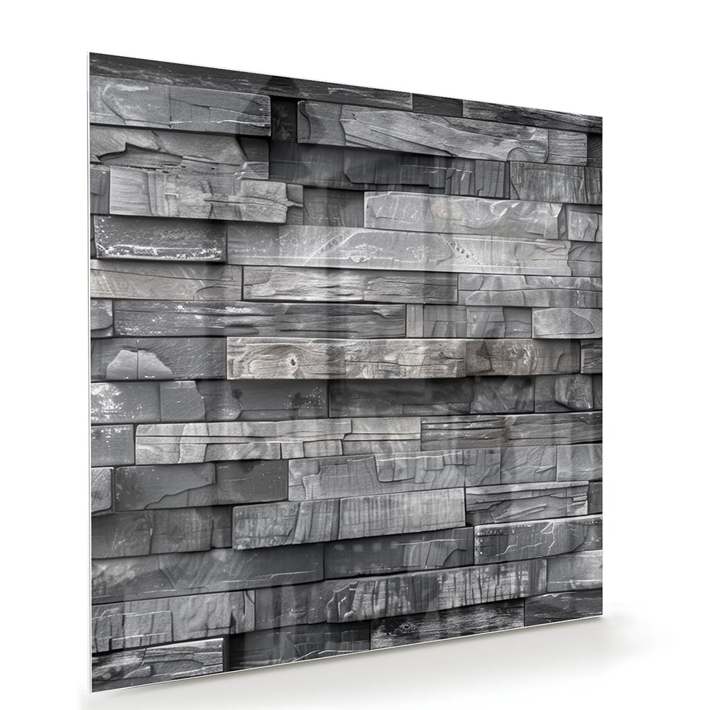 Moderne glazen schilderij met grijze texturen aan een lichte muur.