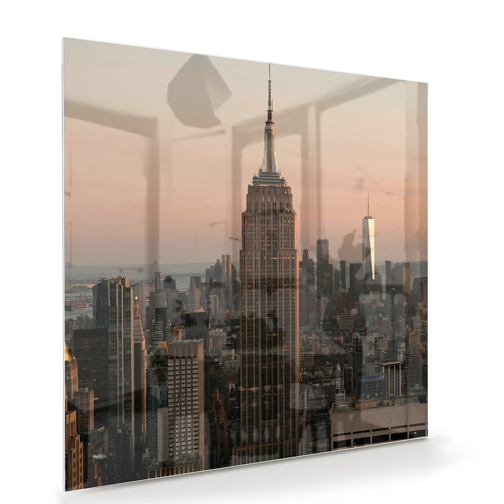 Glazen schilderij van de Empire State Building met een mooie zonsondergang