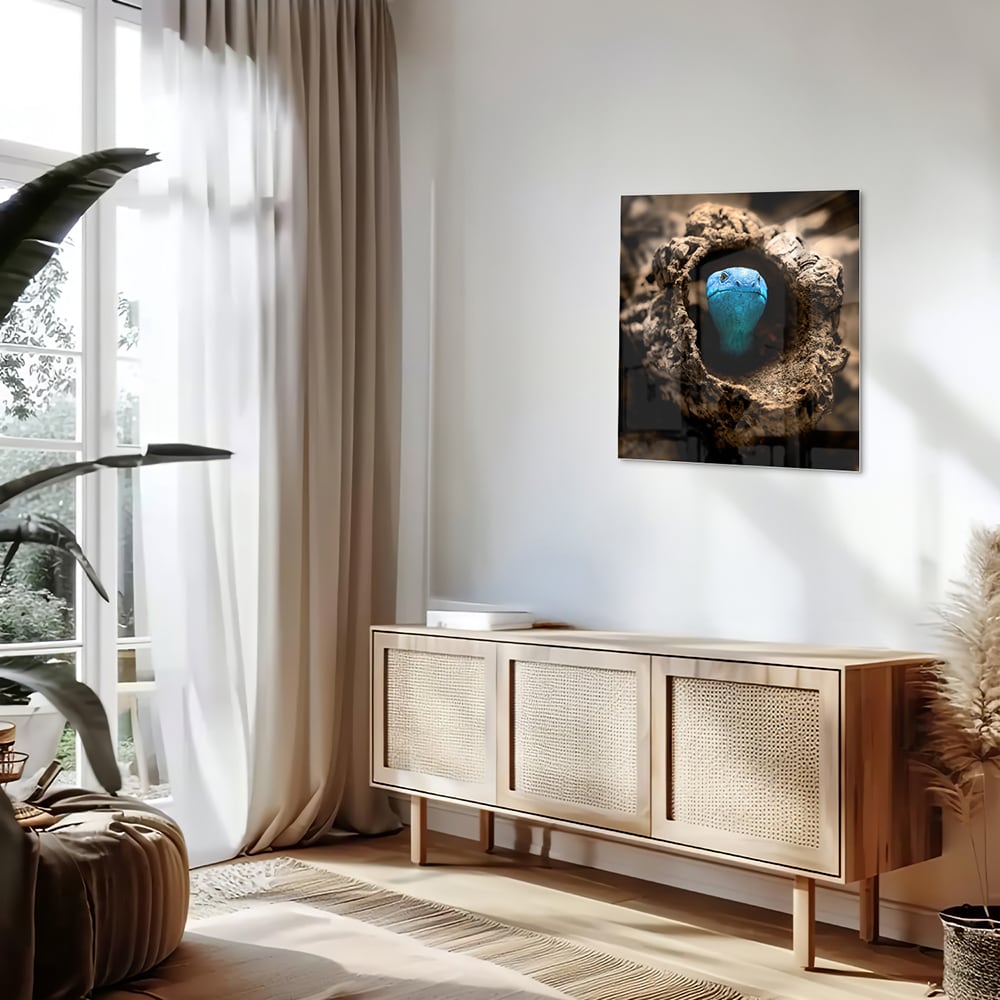 Glas schilderij met een blauwe parel in een nest, stijlvol en modern.