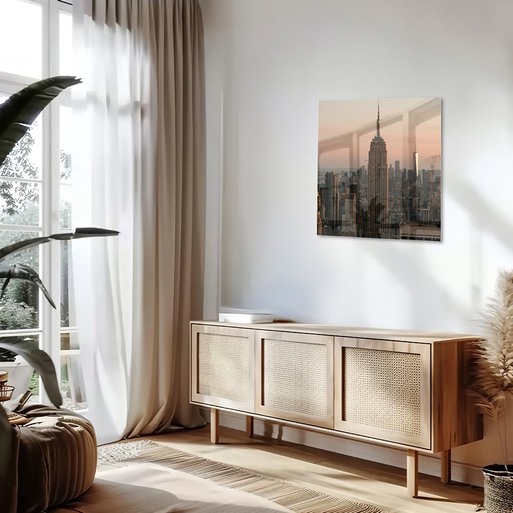 Glazen schilderij van de Empire State Building met een mooie zonsondergang