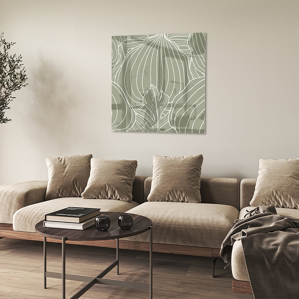 Glazen schilderij met lijnen in aardetinten aan de muur, stijlvolle woonkamer