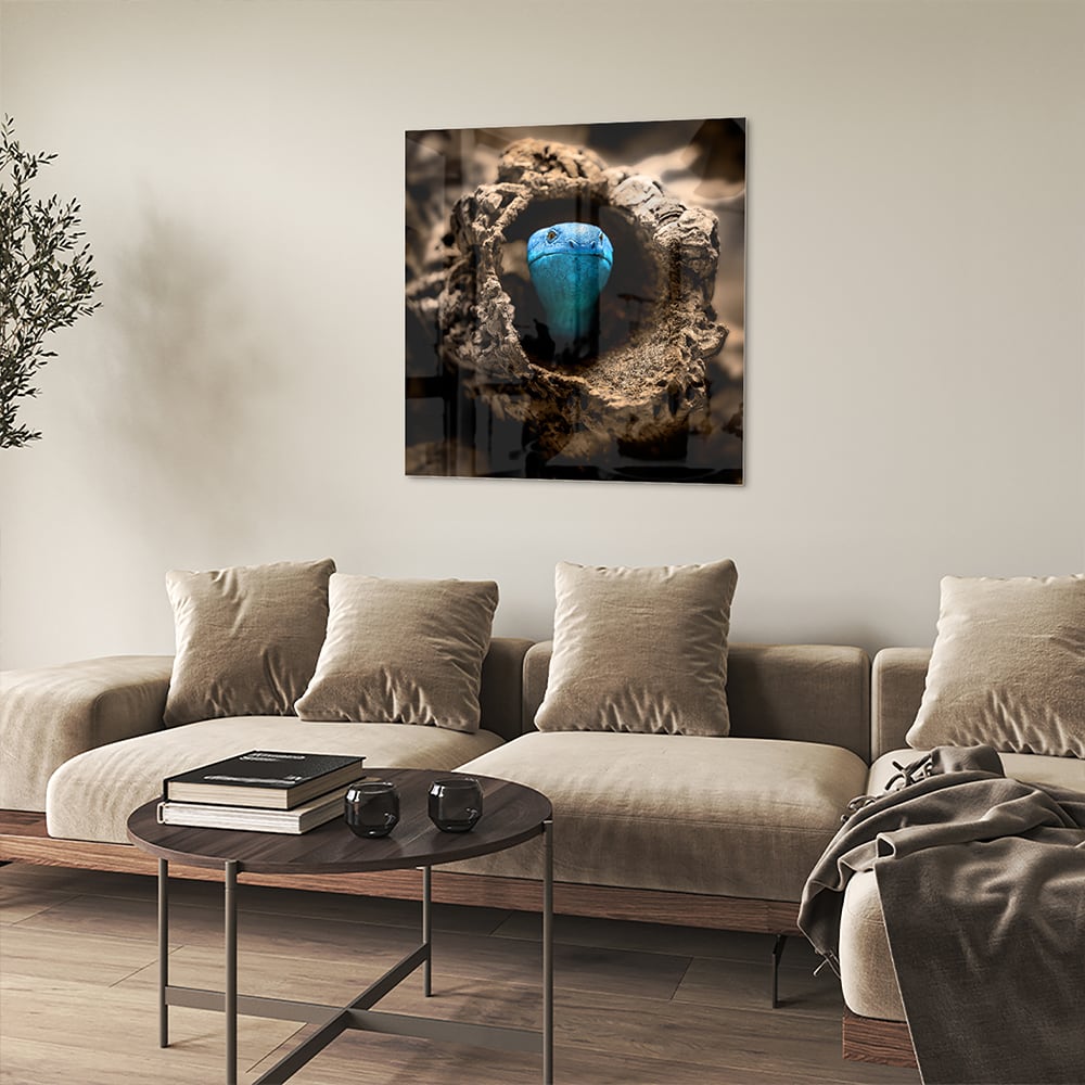 Glas schilderij met een blauwe parel in een nest, stijlvol en modern.