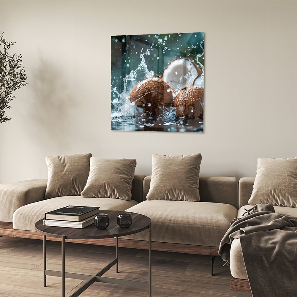 Glas schilderij van kokosnoten met spetters water, perfect voor wanddecoratie.