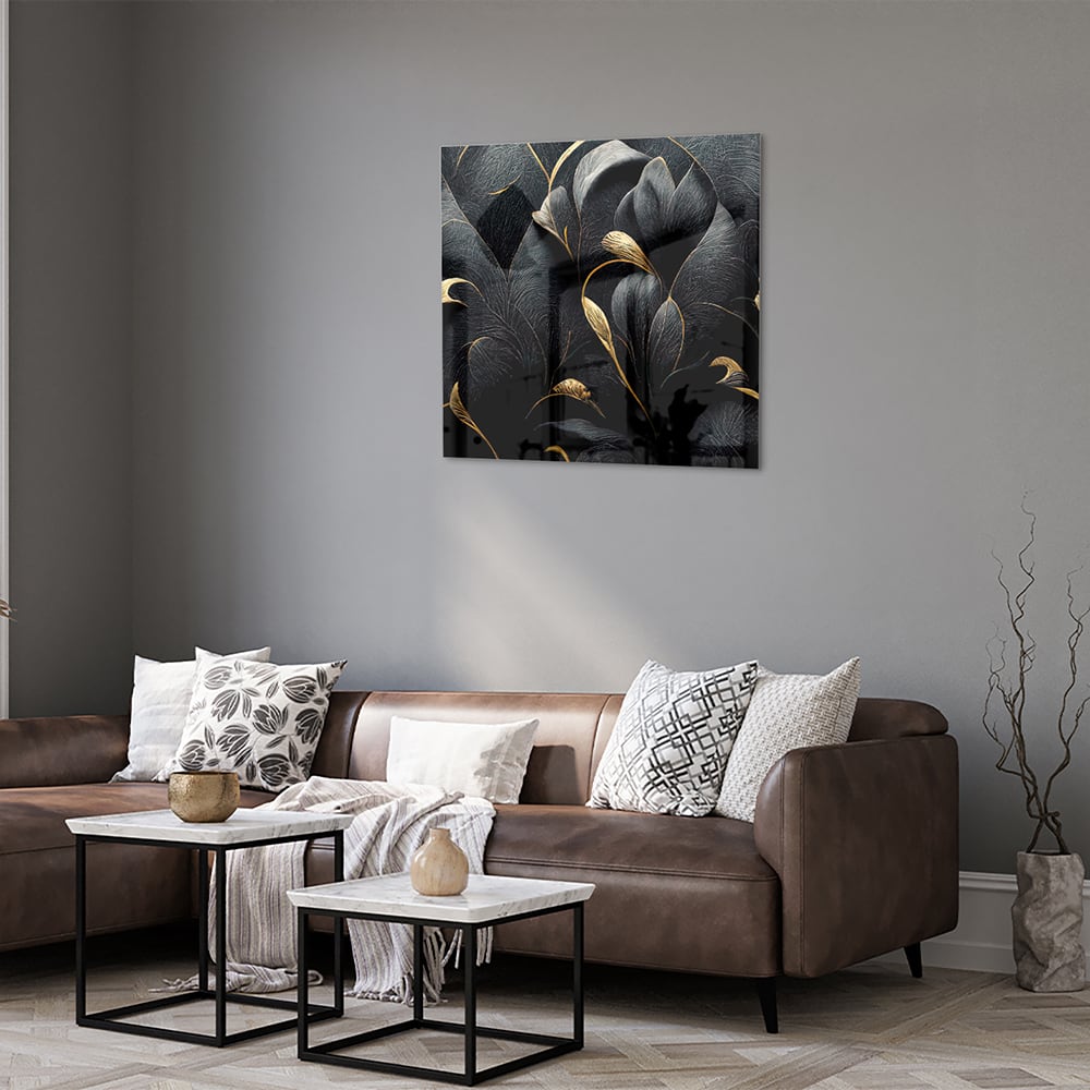 Glazen schilderij met gouden bladeren op een zwarte achtergrond, perfect voor interieur decoratie.