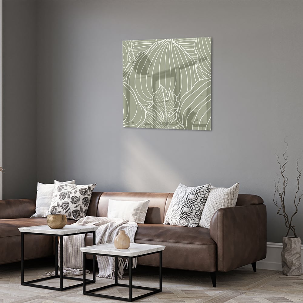 Glazen schilderij met lijnen in aardetinten aan de muur, stijlvolle woonkamer