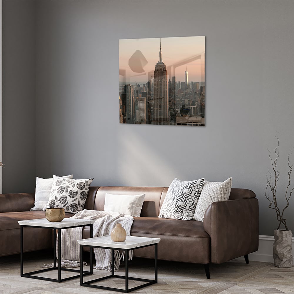 Glazen schilderij van de Empire State Building met een mooie zonsondergang