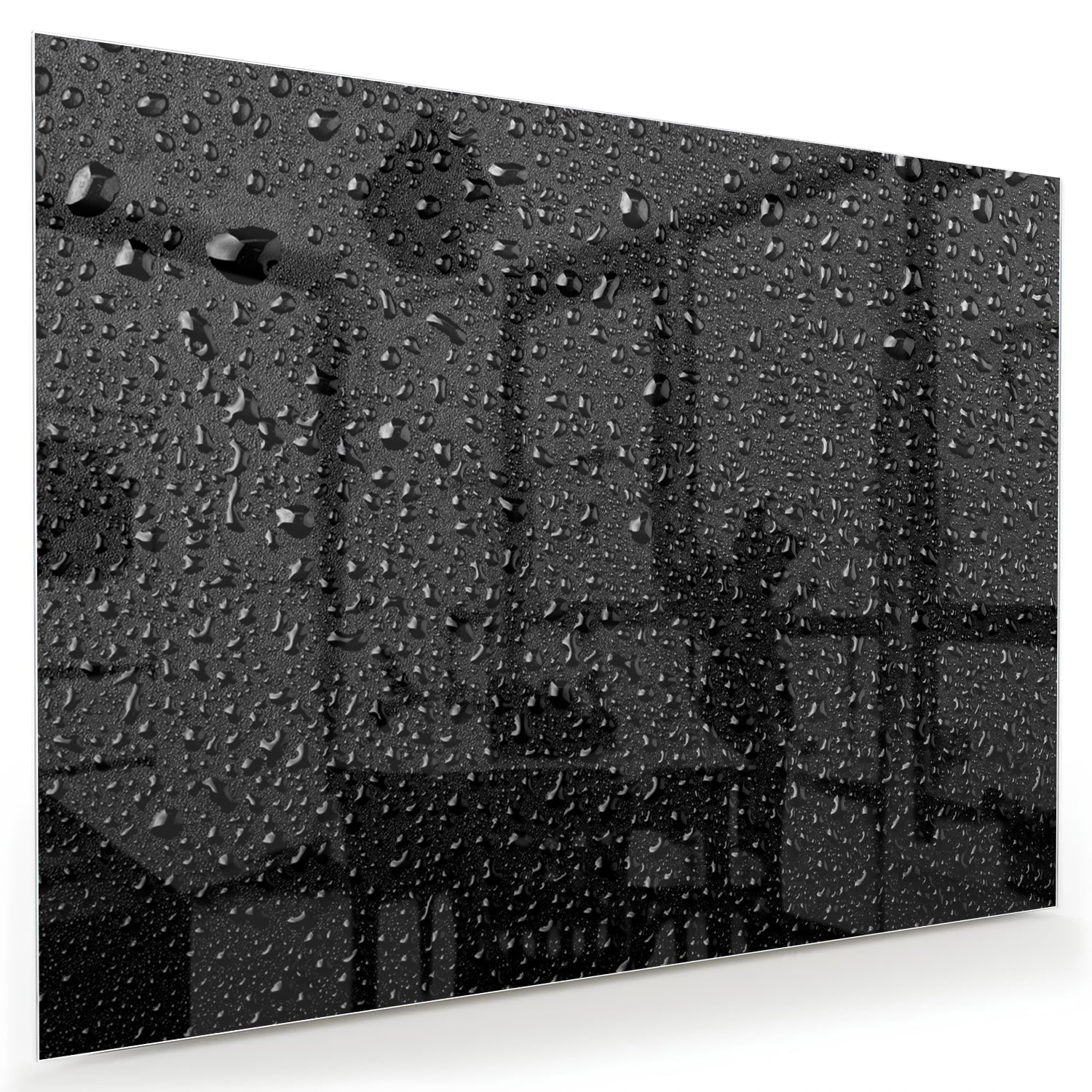 Glas schilderij met druppels op een zwart oppervlak, ideaal voor moderne interieurs.