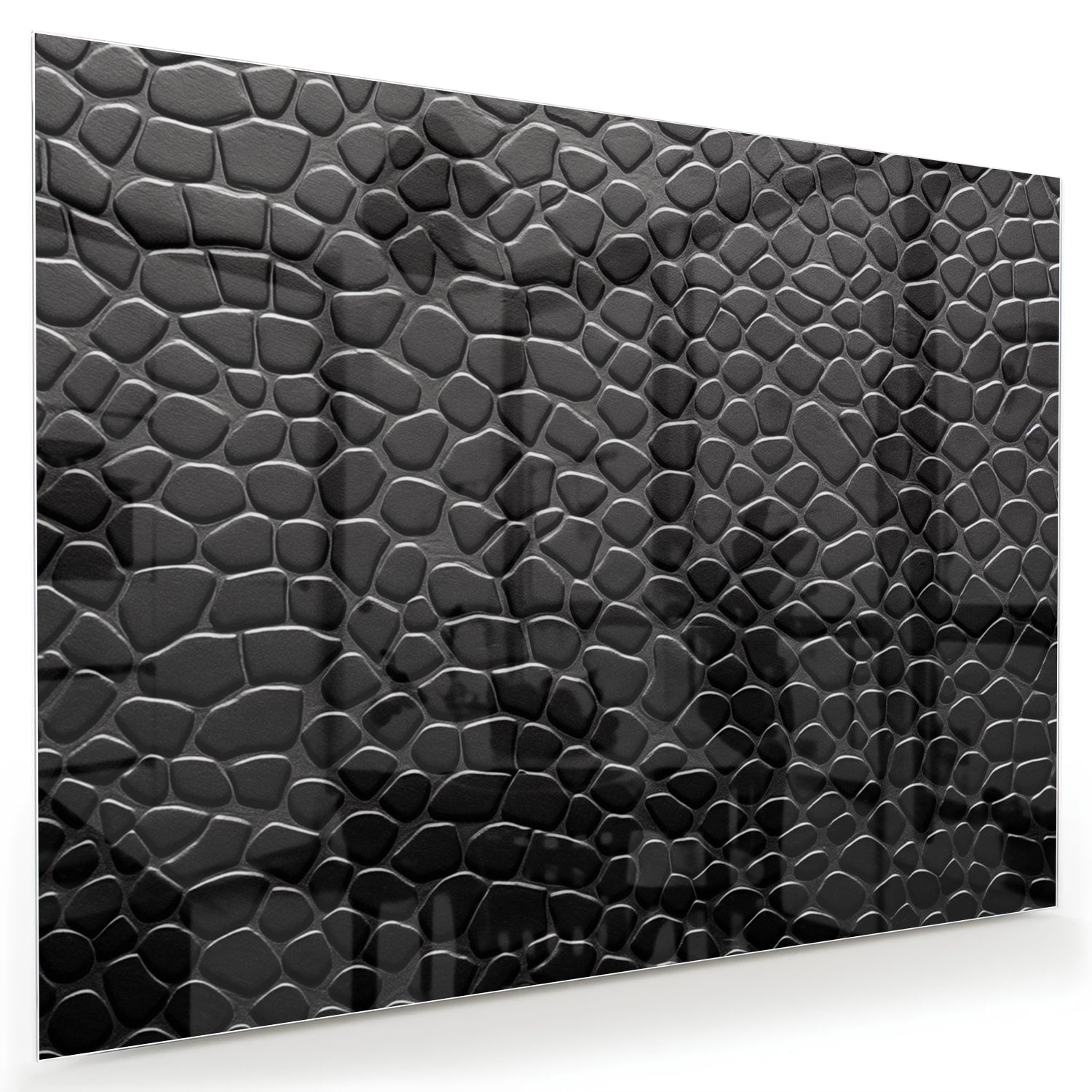 Zwart glazen schilderij met textuur in een moderne woonkamer.