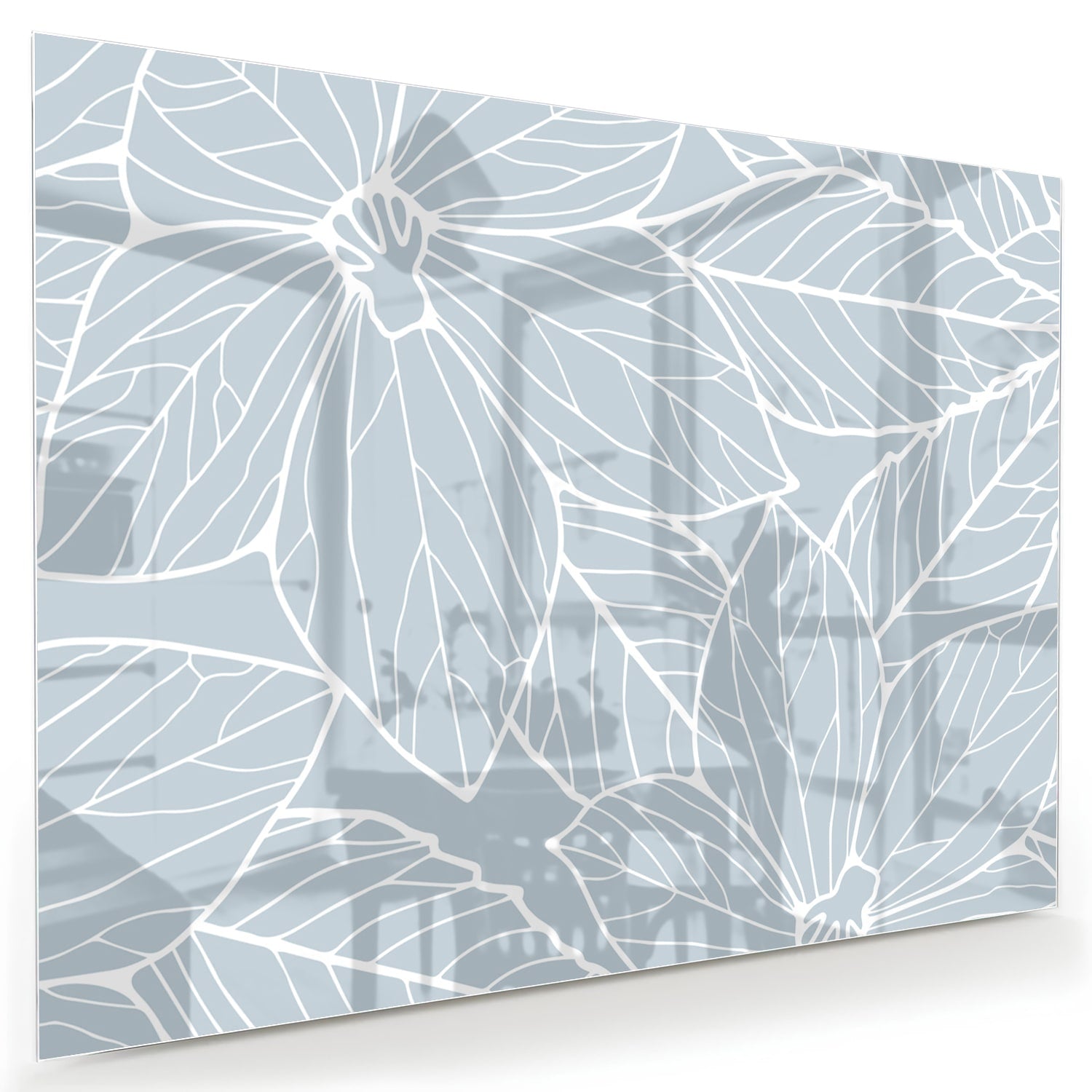 Glazen schilderij met botanische motieven aan de muur in een moderne woonkamer.
