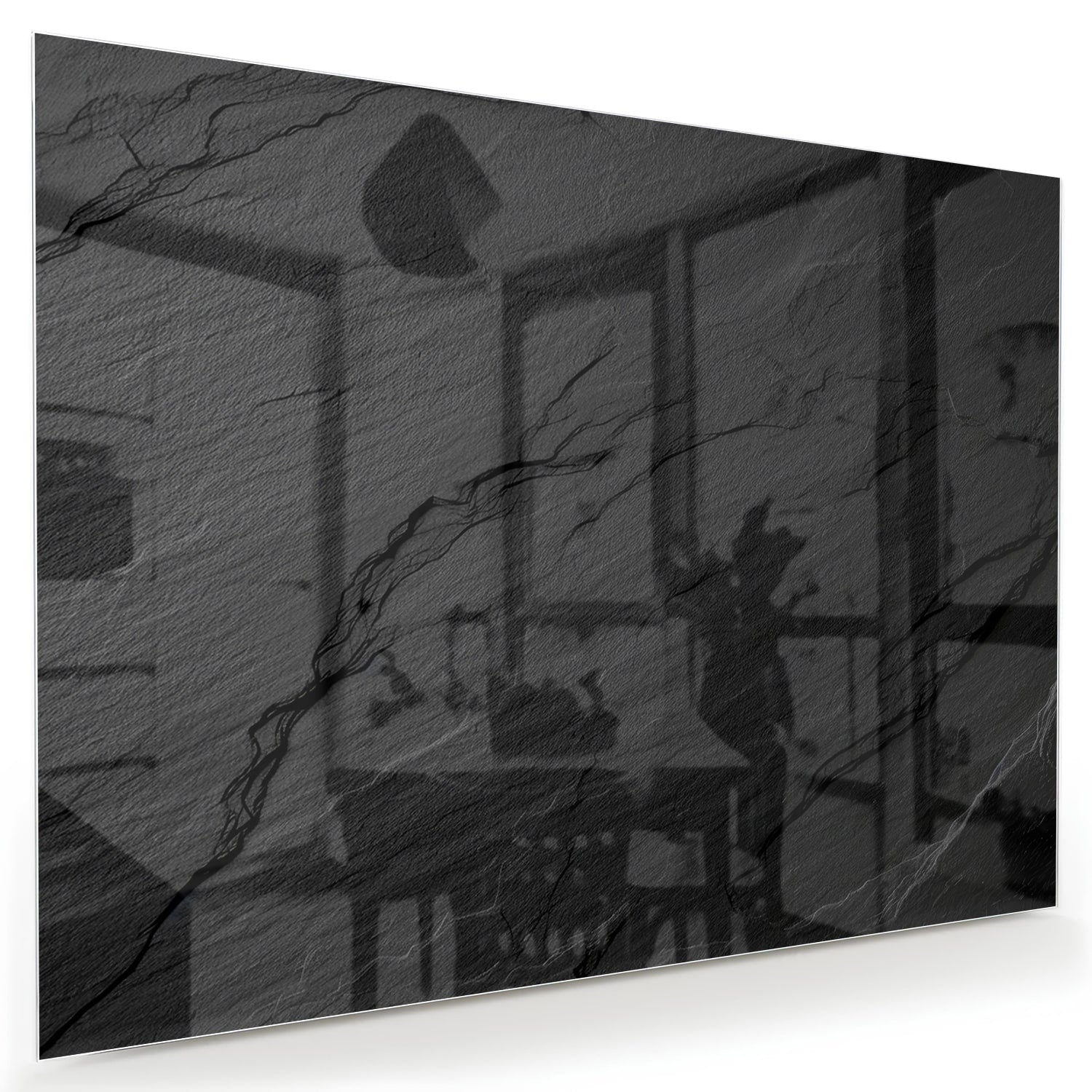 Modern glazen schilderij met abstracte zwart-witte patronen aan de muur.
