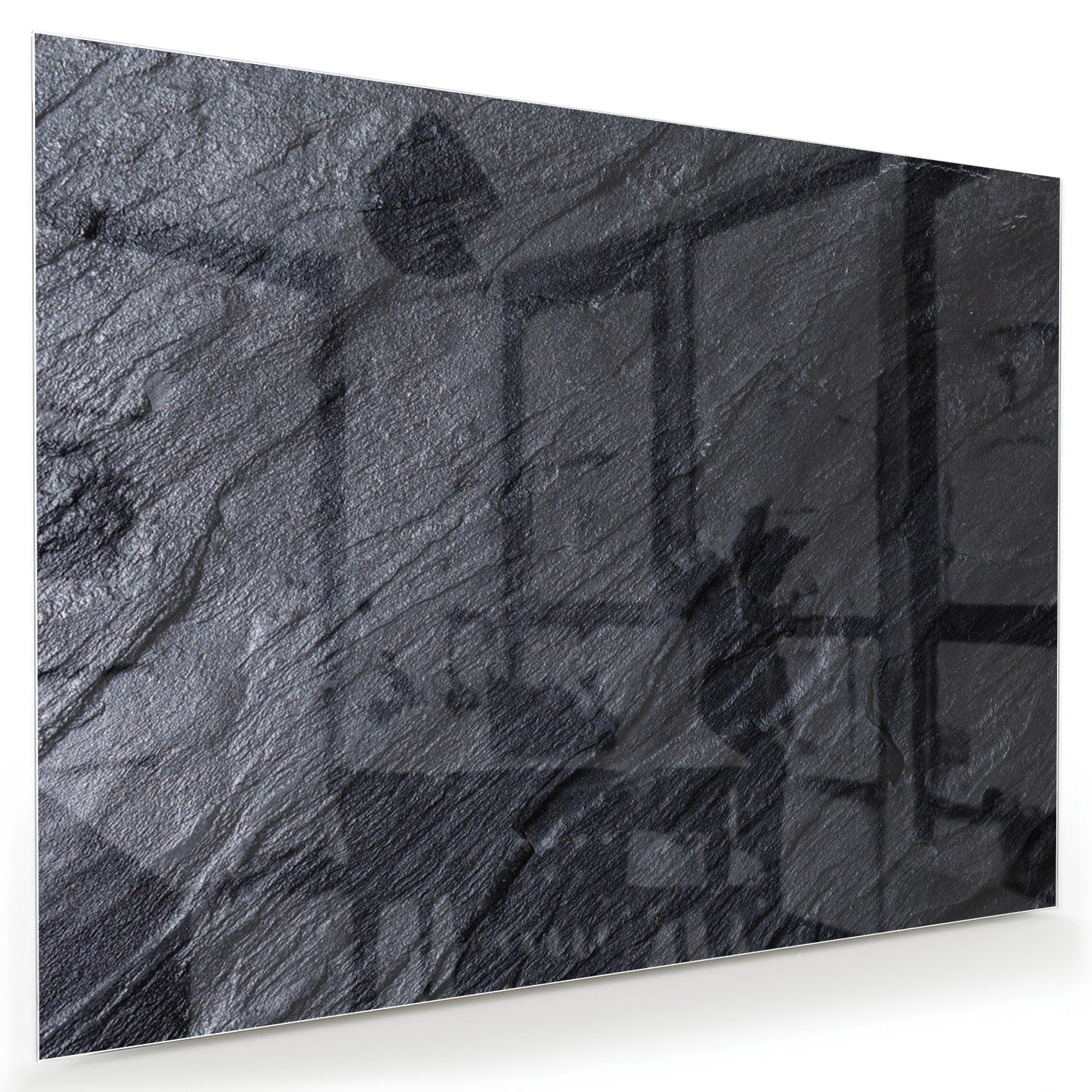 Modern glazen schilderij met abstracte zwart-witte textuur aan de muur.