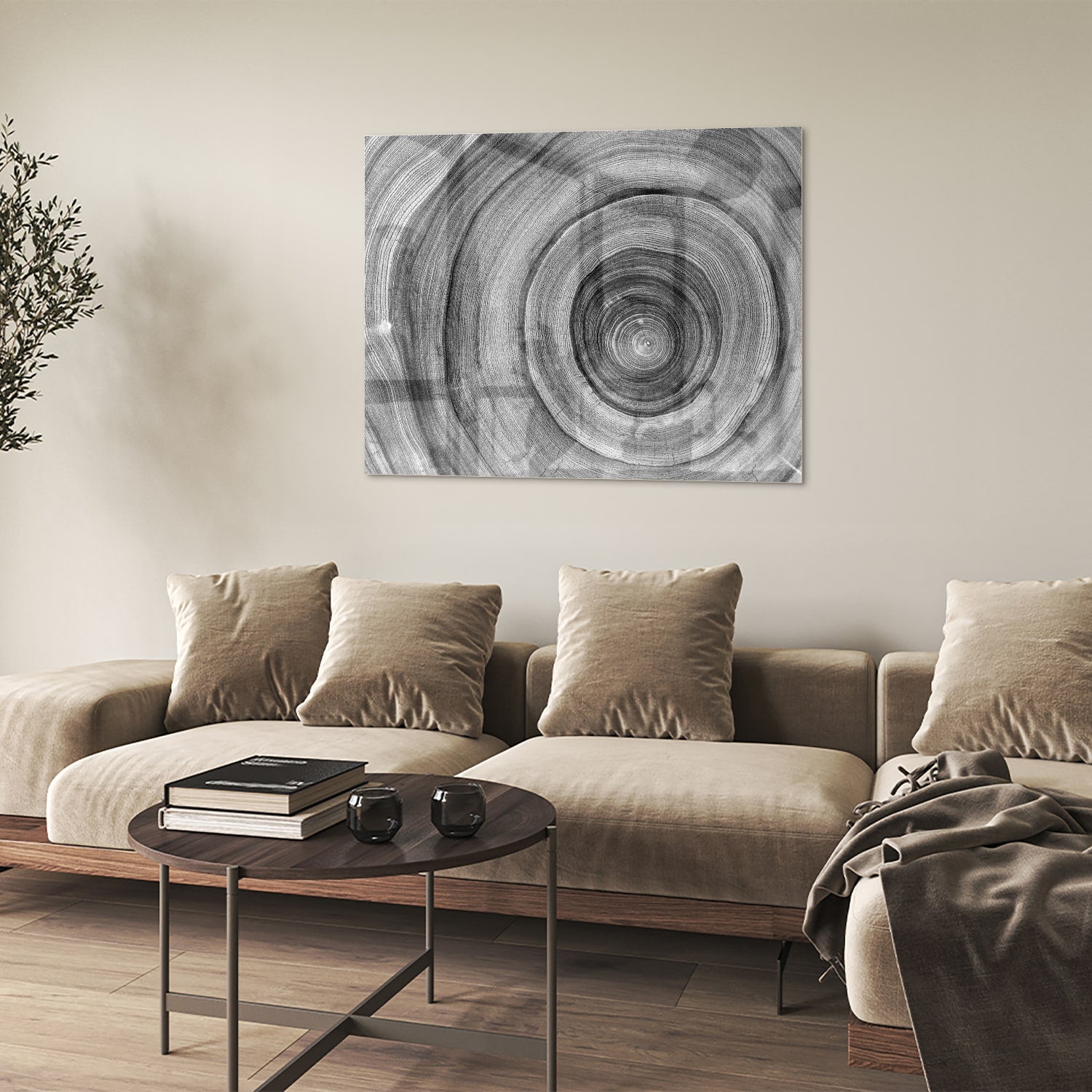 Abstract glazen schilderij in grijstinten met cirkels aan de muur
