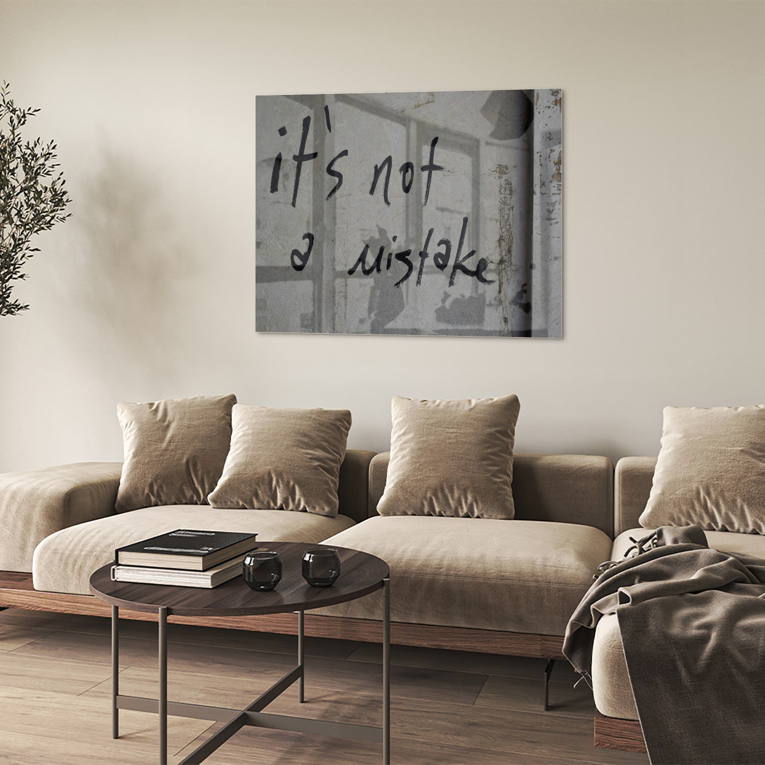 Glazen schilderij met de tekst 'it's not a mistake' aan de muur