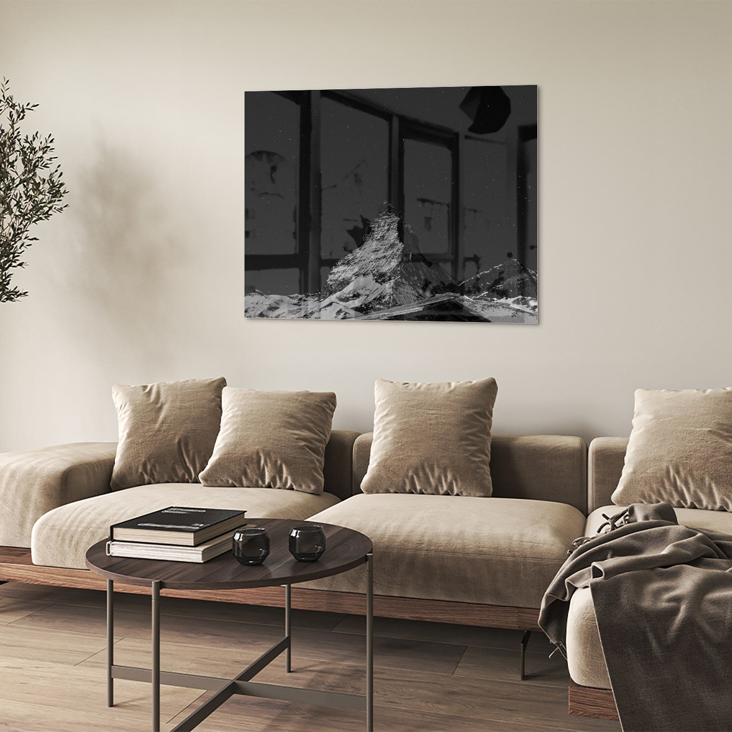 Zwart-wit glazen schilderij met een berglandschap boven een moderne kast