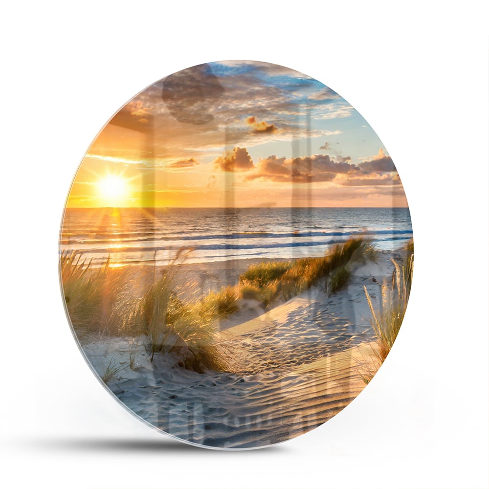 Glazen schilderij van een zonsondergang bij het strand met duinen en gras