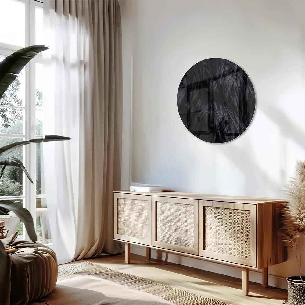 Zwart glazen schilderij met abstracte patronen aan de muur